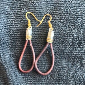 Western style earrings. Gold with leather